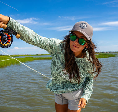 When She’s Out-Fishing You: Women's Outdoor Gear That Keeps Up