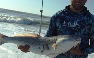 Angler Surf Fishing Redfish