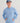 Light blue hoodie with Huk logo on chest and matching blue baseball cap with Huk emblem.