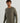 Man wearing HUK Men's Waffle Long Sleeve Crew in Heather Moss