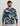 Man wearing black, white, and gray camouflage print lightweight fleece hoodie with long sleeves and hood.