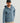 Man wearing HUK Men's Whitecap Full Zip Fleece Hoodie in Stormy Blue