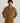 Man wearing HUK Men's Camden 1/4 Snap Fleece Pullover in Sundune Heather