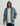 Man wearing HUK Men's Cotton Fleece Full Zip Hoodie in Stormy Blue