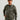 Man wearing HUK Men's Coldfront+ KC Printed 1/2 Zip Fleece Hoodie in Black