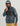 Man wearing HUK Men's Coldfront+ KC Printed 1/2 Zip Fleece Hoodie in Stormy Blue