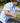 Huk men's KC Kona Button-Down in Blue Shadow Palm Slam, stretch button-down fishing shirt, worn on the water