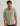 Man wearing HUK Men's Hanahan Long Sleeve Flannel Shirt in Moss