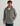 Man wearing HUK Men's Easton Hooded Jacket in Sharkskin Heather