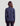 Woman wearing navy blue 1/4 zip pullover with long sleeves, shown from back view.