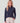 Navy heathered fleece half-zip pullover with long sleeves and ribbed collar worn with cream drawstring pants.
