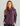 Woman wearing HUK Women's Camden Snap Fleece Pullover in Coastl Dsk Heather