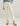 Woman wearing HUK Embark Pant in Silver Birch