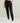 Woman wearing HUK Women's Coldfront+ Fleece Jogger in Heather Black