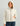 Woman wearing HUK Women's Crosscurrent Jacket in Silver Birch