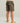 Kids' swim shorts with brown and tan camouflage pattern, elastic waistband, and two front pockets.