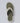 A single flip-flop sandal shown from a top-down view on a light gray background. The sandal features an olive green ribbed footbed, a white outer edge, and a camouflage-patterned strap with a debossed 'U' logo.